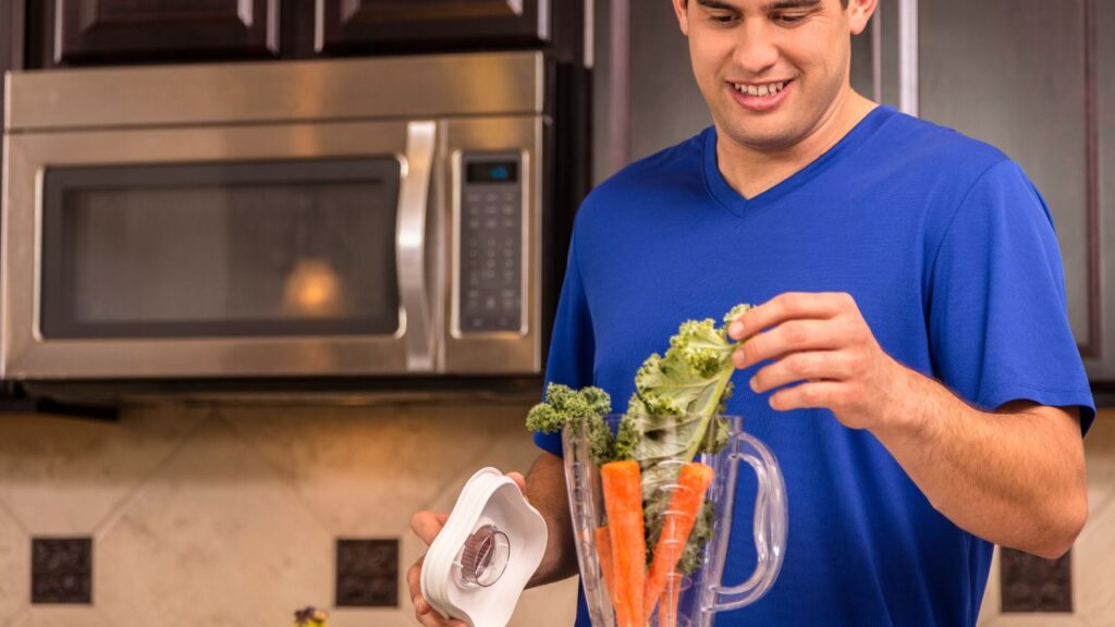 Budget Conscious man-prepares-veggie smoothie