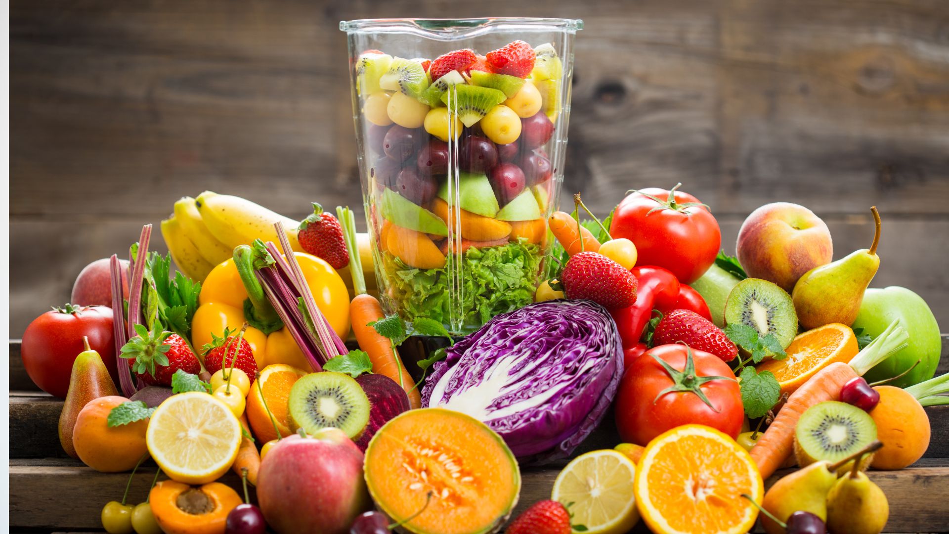 Fresh fruits and vegetables in the blender