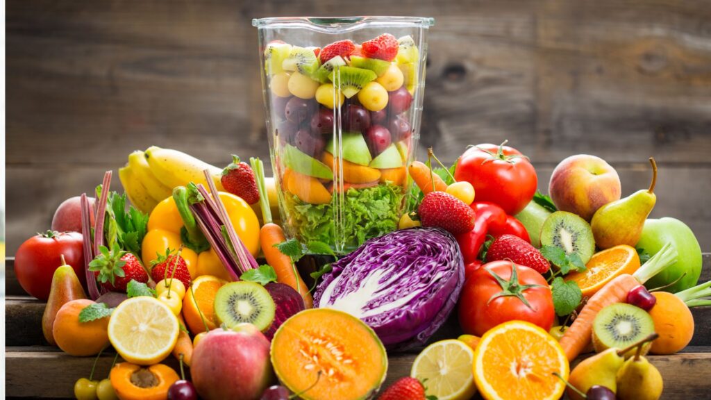 Fresh fruits and vegetables in the blender