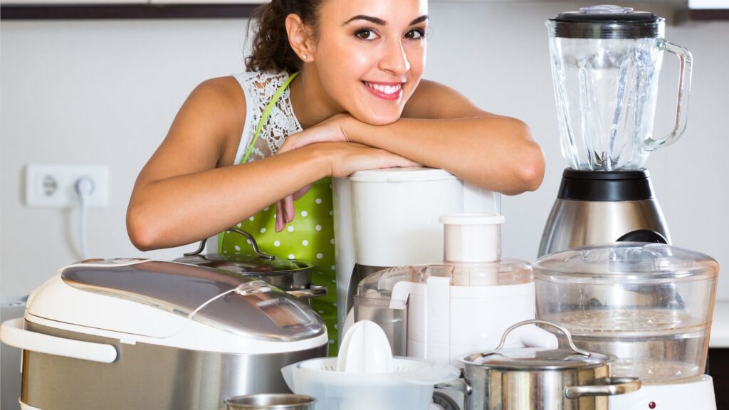 Girl-with-kitchen-appliances-at-home